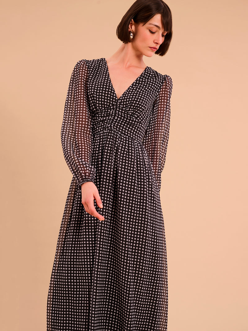 Long sleeved, v neck midi dress in black with white gingham print and ruching at the waist