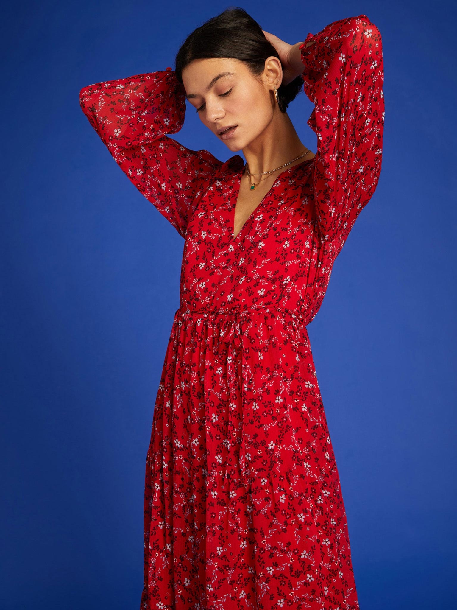 Mid-length wrap dress with red floral print